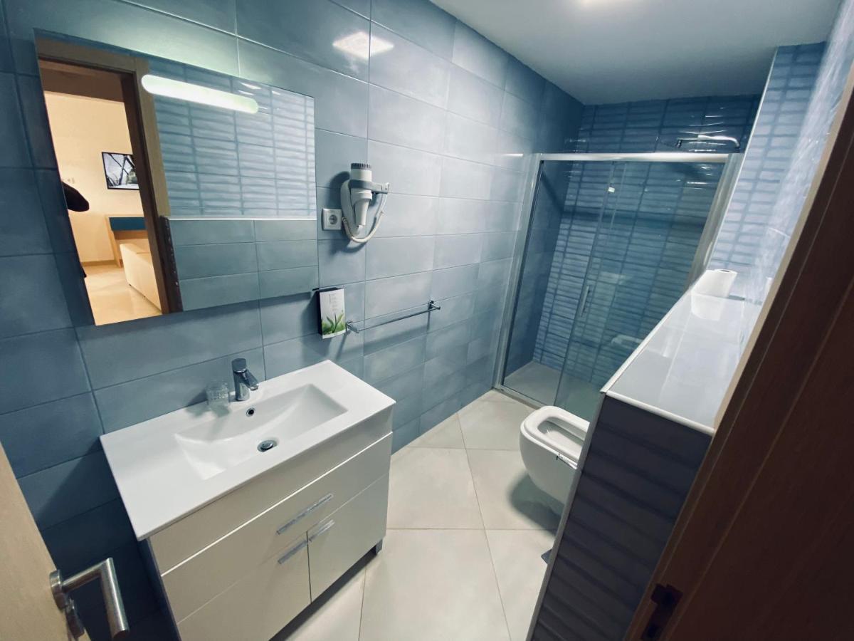 Aparthotel Nhaterra Santa Maria Bagian luar foto