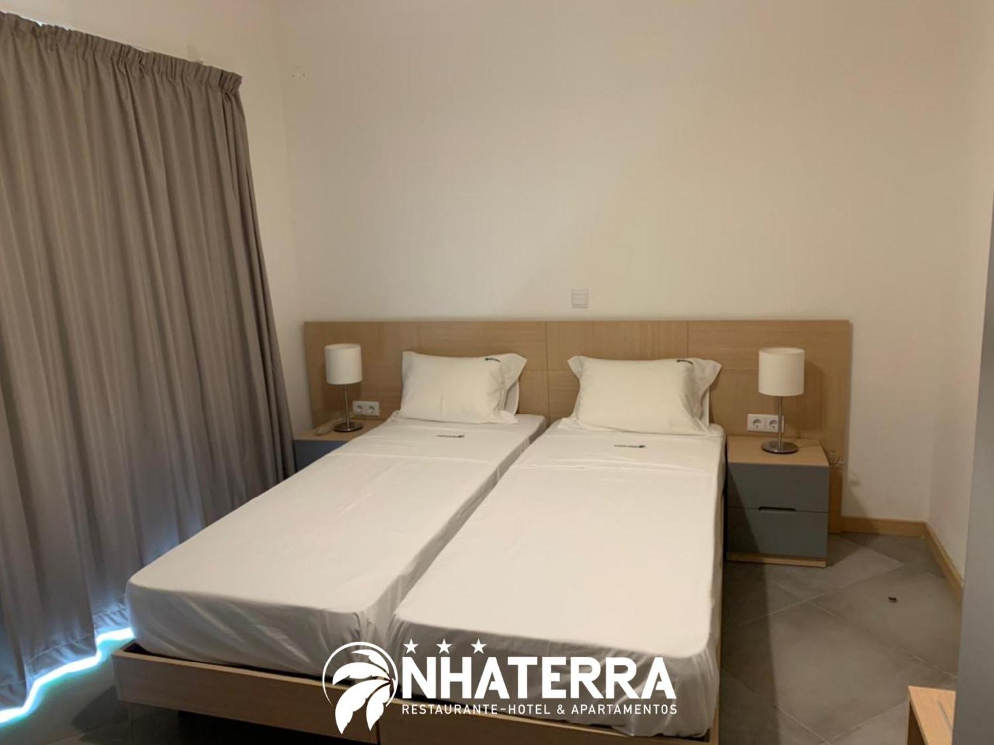 Aparthotel Nhaterra Santa Maria Bagian luar foto